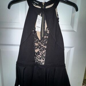 Bebe Black lace peplum